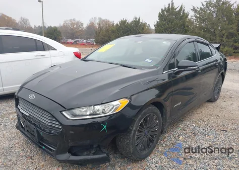 2015 Ford Fusion Hybrid Se z USA, uszkodzony, nr VIN 3FA6P0LUXFR213752